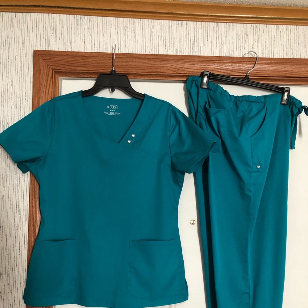 Women’s nursing scrubs with stylish buttons.
